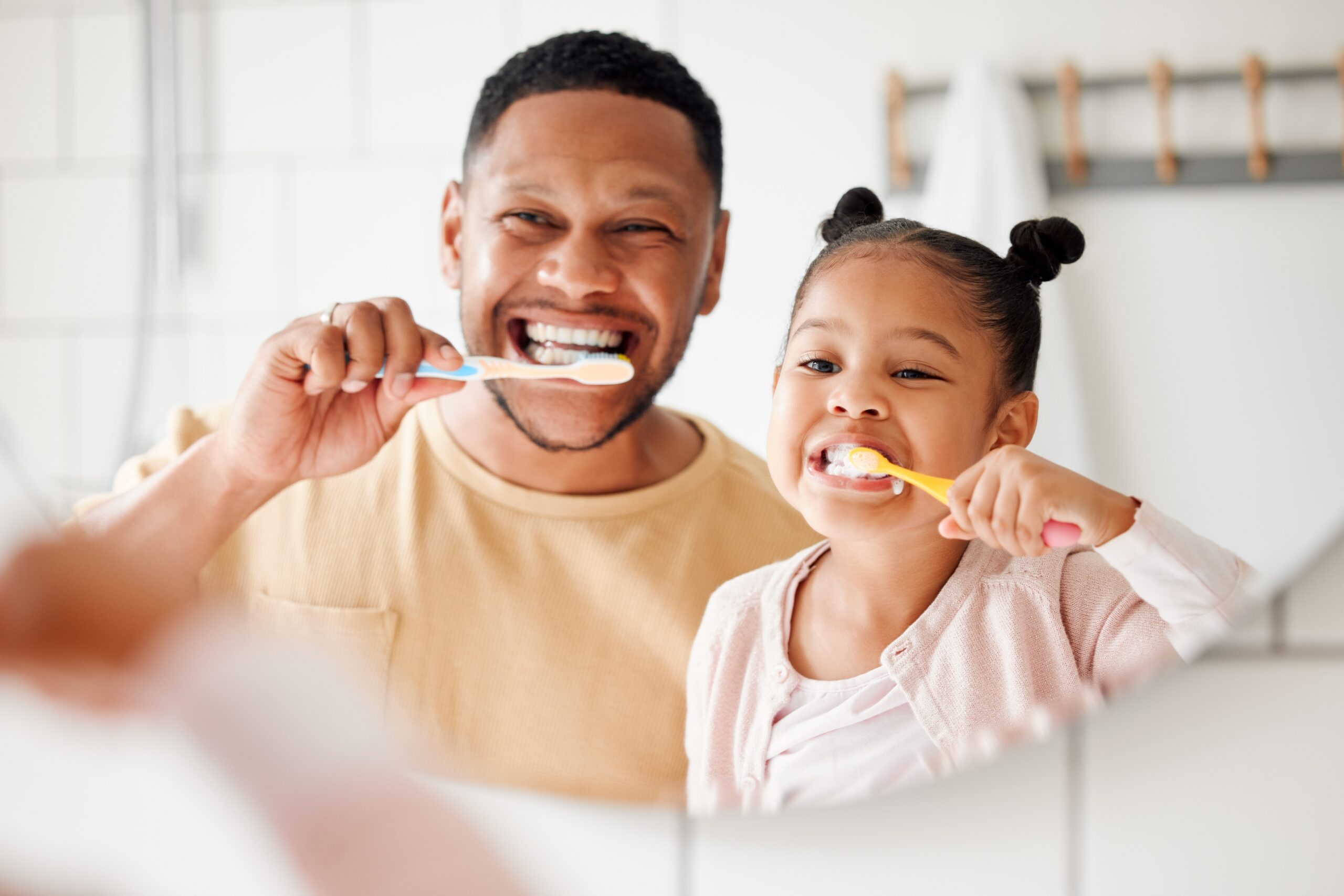 father and daughter practicing preventive dentistry in Owensboro